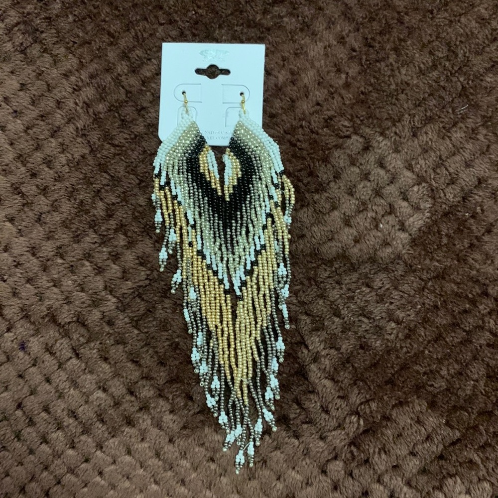 Beaded long earrings. Never been worn. Gold, silver, black and white.